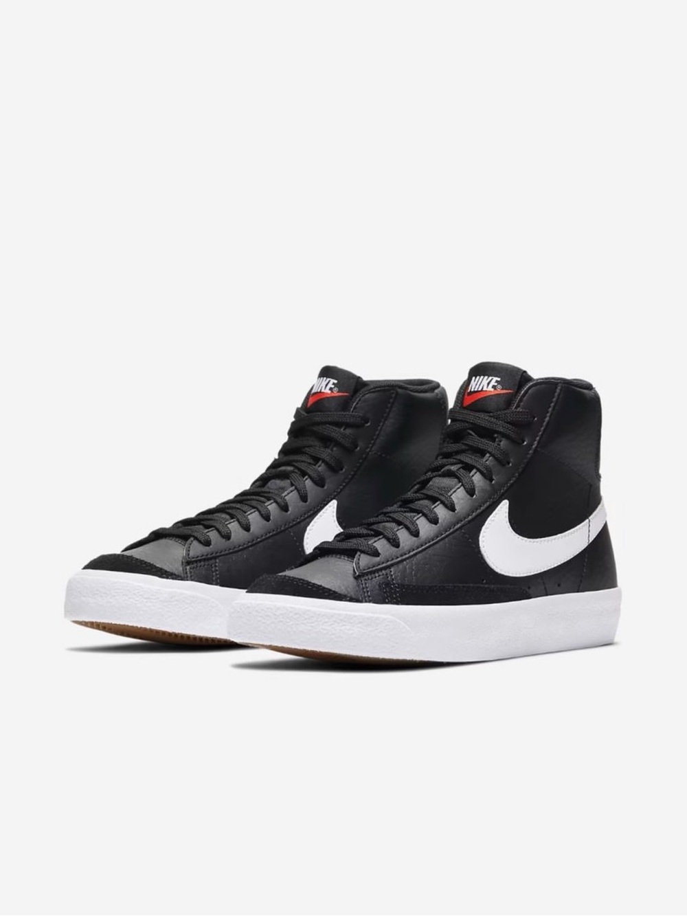 Nike Black and White Mid-Top Sneakers with Red Tongue Logo